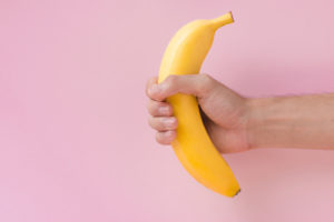 hand holding banana